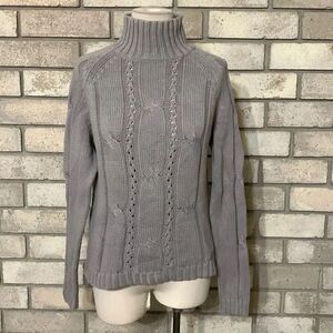 3for$20 sweater medium runs on shorter side